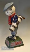 Dunlop Caddy advertising golfing figure-mounted on naturalistic splayed base inscribed to 2