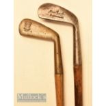 2x Metal iron head shaped golf walking sticks one showing the Thistle brand cleek mark and a