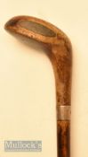Unnamed stained wooden driver head style golf walking stick with black fibre sole insert, rear