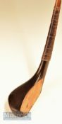 T Dunne narrow wide head dark stained baffing spoon c1880 fitted with full brass sole plate