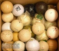 Various Loose vintage golf balls featuring some modern play hickory event balls, other examples