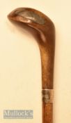 An attractive small wooden driver head styled golf walking stick with generous black fibre sole