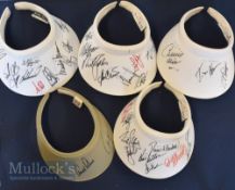 5x Multi-signed golfing sun visors featuring signatures such as Ernie Els, Lee Westwood, Darren