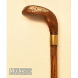 Brown stained driver head styled golf walking stick with unusual alloy sole insert, rear lead