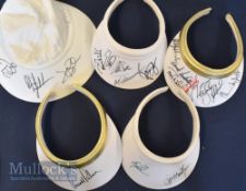 5x Multi-signed golfing sun visors featuring signatures such as Davis Love III, Mark Cal, Peter