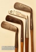 Most unusual MJ Lewis registered perfect putter with sharp raised hosel and oval shaft, and a square
