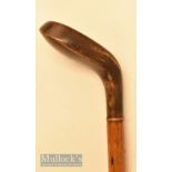 Large brown stained drop toed golf walking stick stamped with the initials TF to the crown