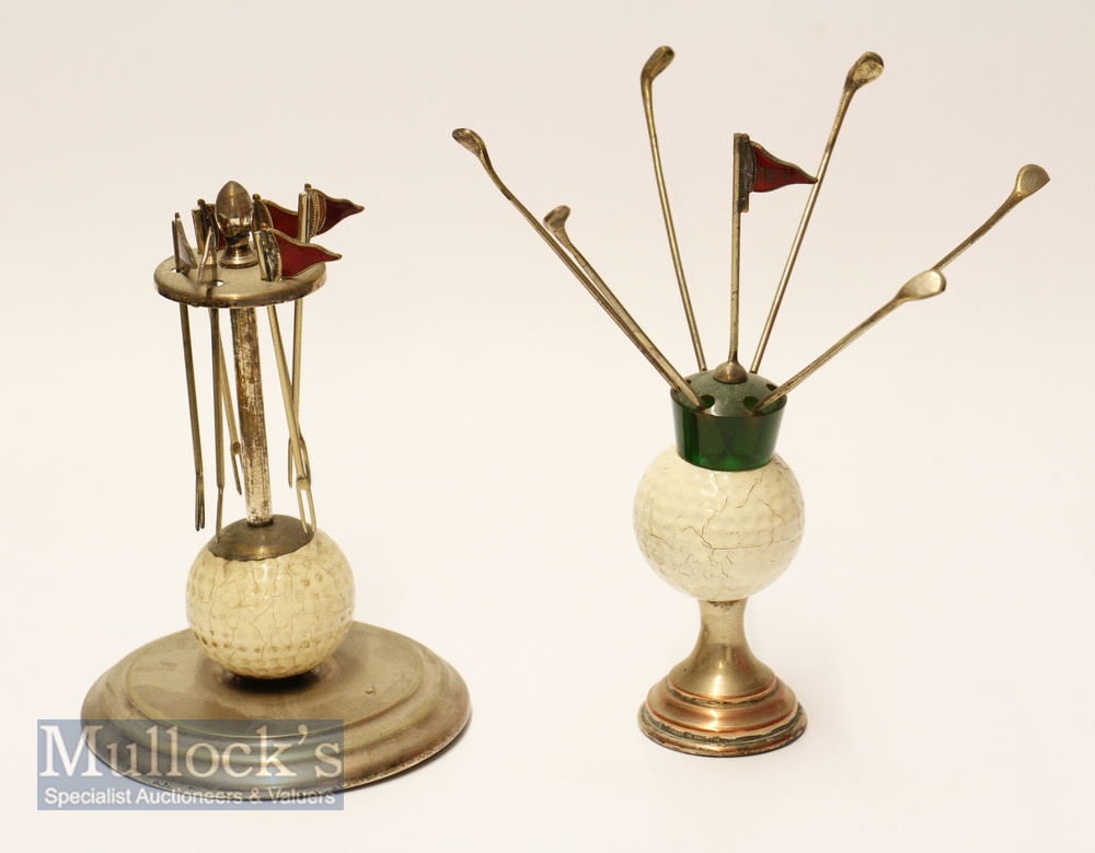 Golfing Cocktail Sticks and Stands (2) both with bramble golf ball bodies with silver plated mounts,
