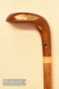 An attractive small wooden head driver shaped golf walking stick with rounded sole, brown fibre