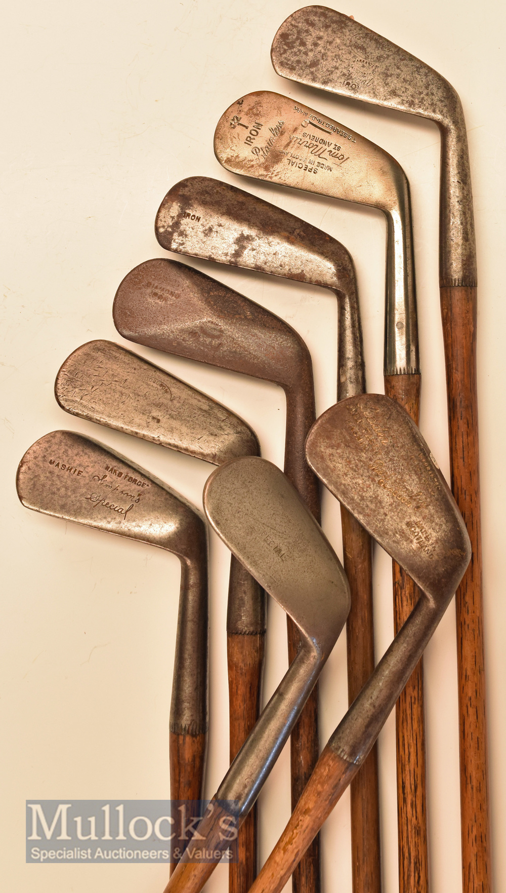 8x Assorted irons including Tom Morris Signature no.1 iron stamped with Tom Stewart pipe mark and