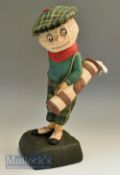 Dunlop Caddy advertising golf figure appears with signs of restoration on naturalistic splayed base,