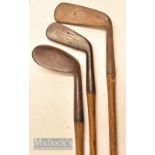 3x various irons incl a dish faced niblick with slightly bowed shaft, Tom Stewart pipe mark cleek