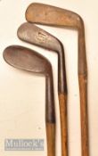 3x various irons incl a dish faced niblick with slightly bowed shaft, Tom Stewart pipe mark cleek