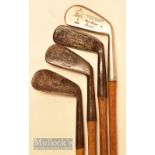 A Watt Carnoustie juvenile putter and mid-iron together with together with a J. Morris Carnoustie