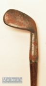 St Andrews small head rut iron with unusual rolled convex face fitted with original hide grip with