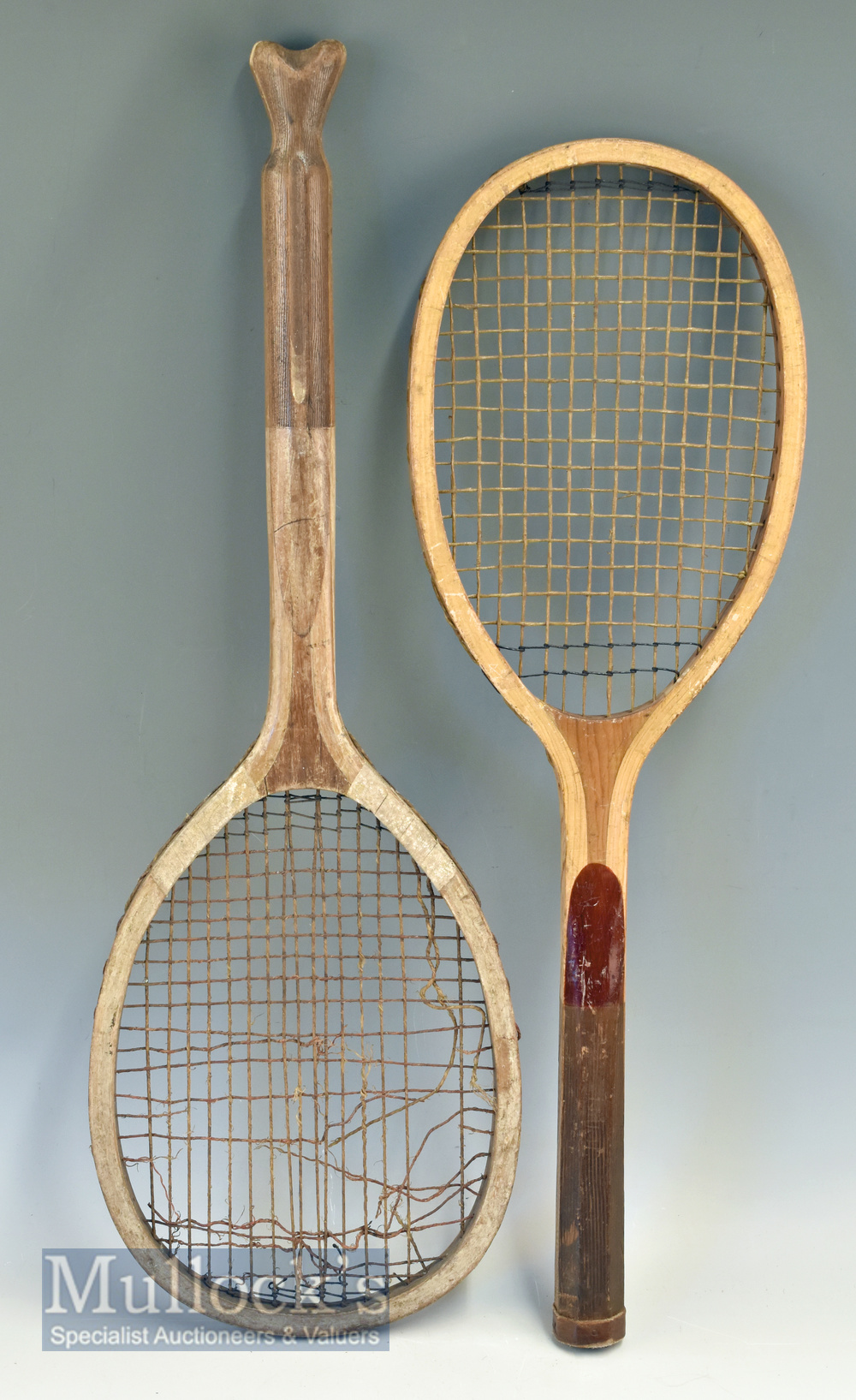 Early wooden ‘Superb’ fishtail tennis racket stamped to throat, some splits to handle with damage to