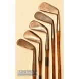 Spalding Kro flite mid iron together with 4x unnamed irons consisting of 2x mashies, a lofted mashie
