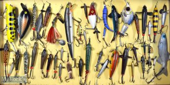 Interesting collection of various fishing lures mounted in a wooden display case (44) – to incl