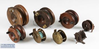 Selection of Wood and Brass fishing reels featuring a 4 ½” unnamed wood and brass starback,