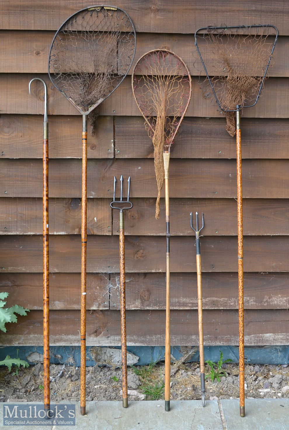 Collection of Vic landing nets, trident eel spears, and gaff together with selection decorative