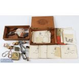 2x Wooden box containing fly-tying accessories, fly casts etc mostly laid between papers with