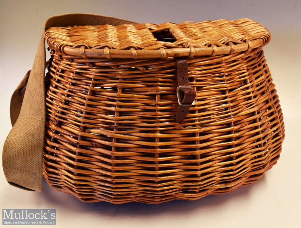 Pot-Bellied wicker fishing creel measuring 44x23x30cm approx., with leather buckle and strap, and