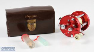 ABU Ambassadeur 6000 multiplier reel finished in red, counter balance handle, with line, runs