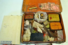 Collection of early fly tying materials contained in small leather suitcase – c/w a parchment