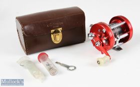 ABU Ambassadeur 6000 multiplier reel stamped 040500, finished in red, counter balance handle, with