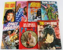 7 Assorted Annuals incl The Fall Guy, The Bionic Woman, The Empire Strikes Back, Dan Dare 1991,