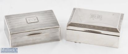 Two Hallmarked Silver Cigarette Boxes one by Walker and Hall with pattern lid border with