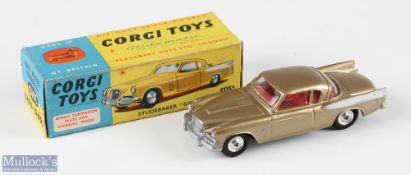 Corgi Toys 211S Studebaker Golden Hawk Boxed Diecast Car in gold tone colour with white wing accents