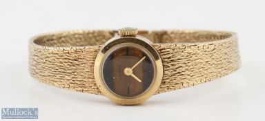 9ct Gold Ladies d’Aubeny Watch with tiger’s eye style face on textured design strap, clasp having .
