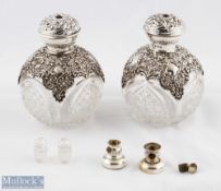 Pair of Edwardian Hallmarked Silver and Cut Glass Perfume Bottles with ornate silver design