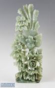 Chinese Green Soapstone Carved Sculpture depicting bird with flowers and leaves, height 34cm, with