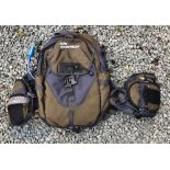 Ron Thompson Hydration Backpack Bag with water bladder compartment for drinking, with several zip
