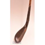 Elegant and early R Simpson Carnoustie dark stained beech wood long nose curved face play club c1880