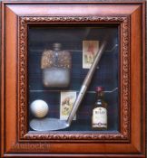 Golf Display Case containing a miniature Bells whiskey, hipflask, golf ball, shortened hickory