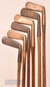 6x various bronze and brass blade putters featuring J P Cochrane & Co Edinburgh, Patrick of Leven