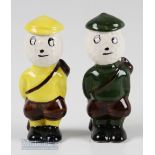 2 Carlton Ware Dunlop Style Caddie Golfing Figures one dressed in yellow and the other green, both