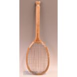 c1905 ‘The Ubique’ wooden fishtail tennis racket with model motif to convex wedge, unknown maker,