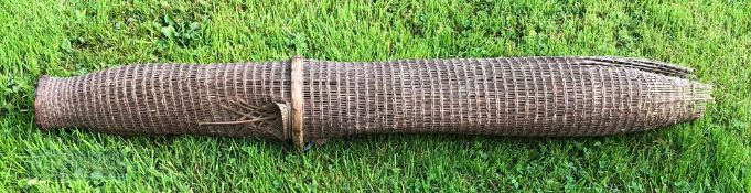 Early Norfolk Eel Trap of split reed construction, length 126cm, with overall signs of age and use