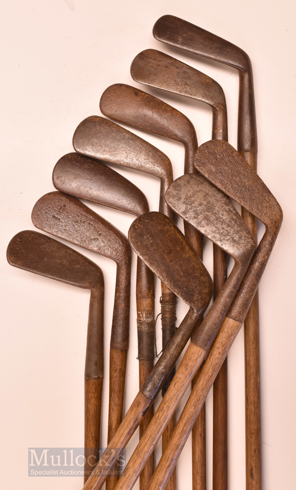 10x smooth faced irons all appear with indistinct or no maker’s marks, some pitted examples, a