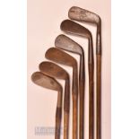 6x Tom Stewart Pipe Mark irons and putters featuring a Mashie niblick (pitted, no grip, shaft