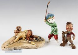 Golfing Ceramics (3) – grotesque golfer figure holding club and bag, unmarked with overall stress