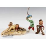 Golfing Ceramics (3) – grotesque golfer figure holding club and bag, unmarked with overall stress