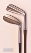 2x steel shafted golf clubs – Tom Stewart “Stewart Supreme” wide sole Blaster – and a Wilson