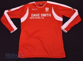 Newtown AFC Home football shirt size XXL, in red, long sleeve, Macron, with League badges to