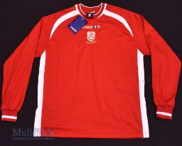 Newtown AFC Home football shirt size M, in red, Macron, long sleeve, with tag, appears unused