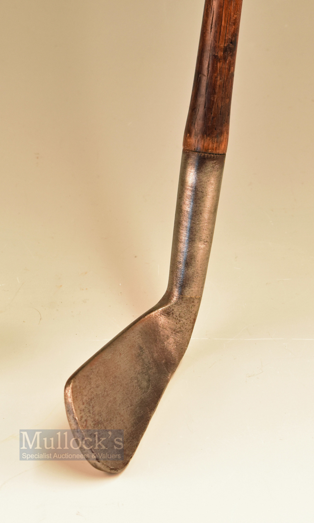 Rare Bussey London Patent steel socket neck mid iron - with concave face, bowed shaft fitted with